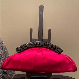 Enzo Angiolini Elegant Satin Red Clutch with Black Accents